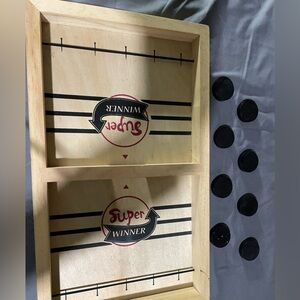 Super Winner Fast Puck Sling Game